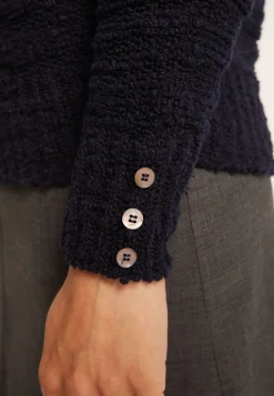 Montagut High-neck jumper with buttoned sleeves - Sumaya