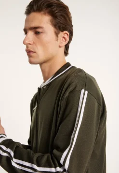 Montagut Zipped cardigan in Fil Lumière - Paddy
